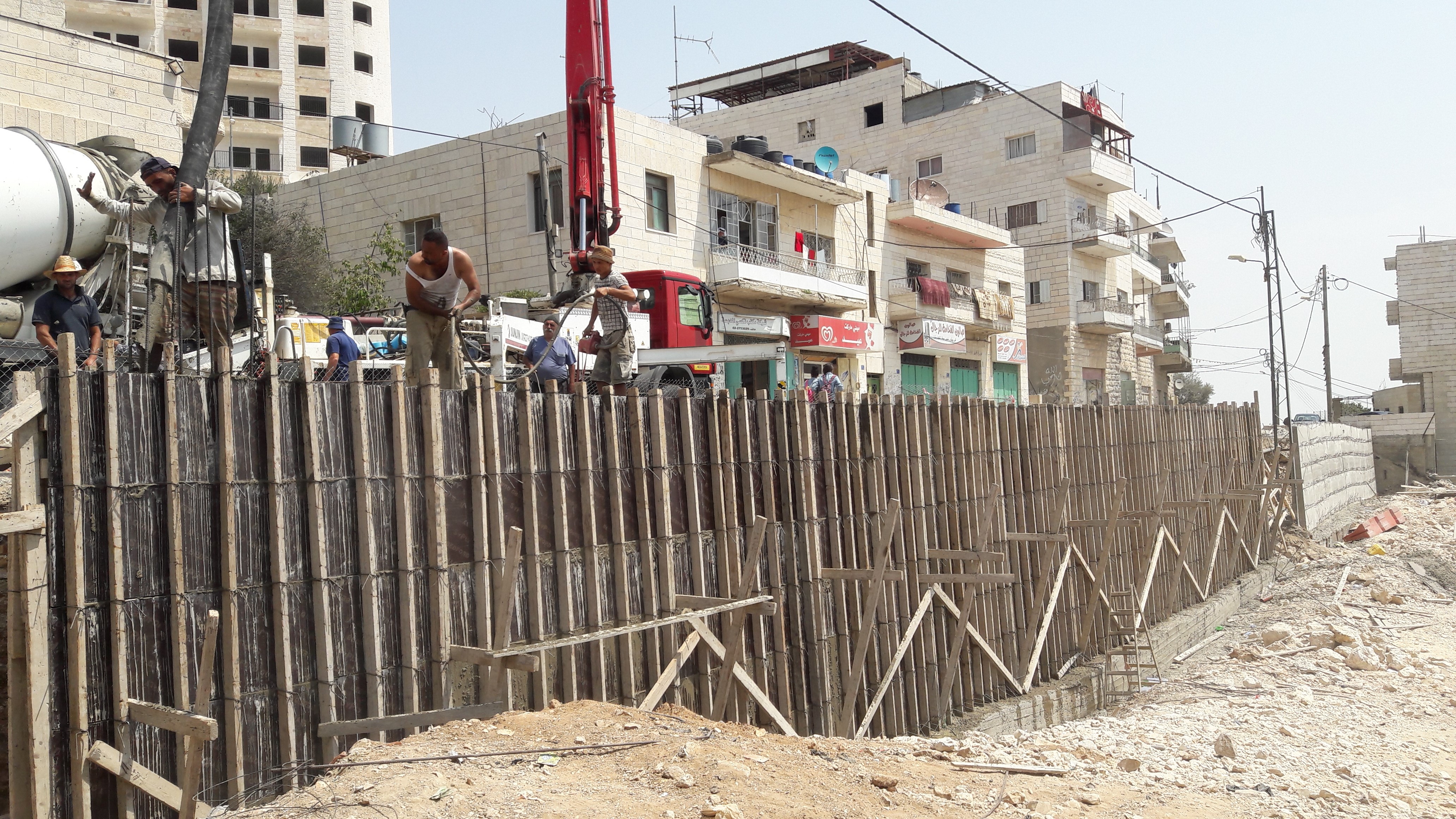 بالصور - أعمال تأهيل شارع الصف