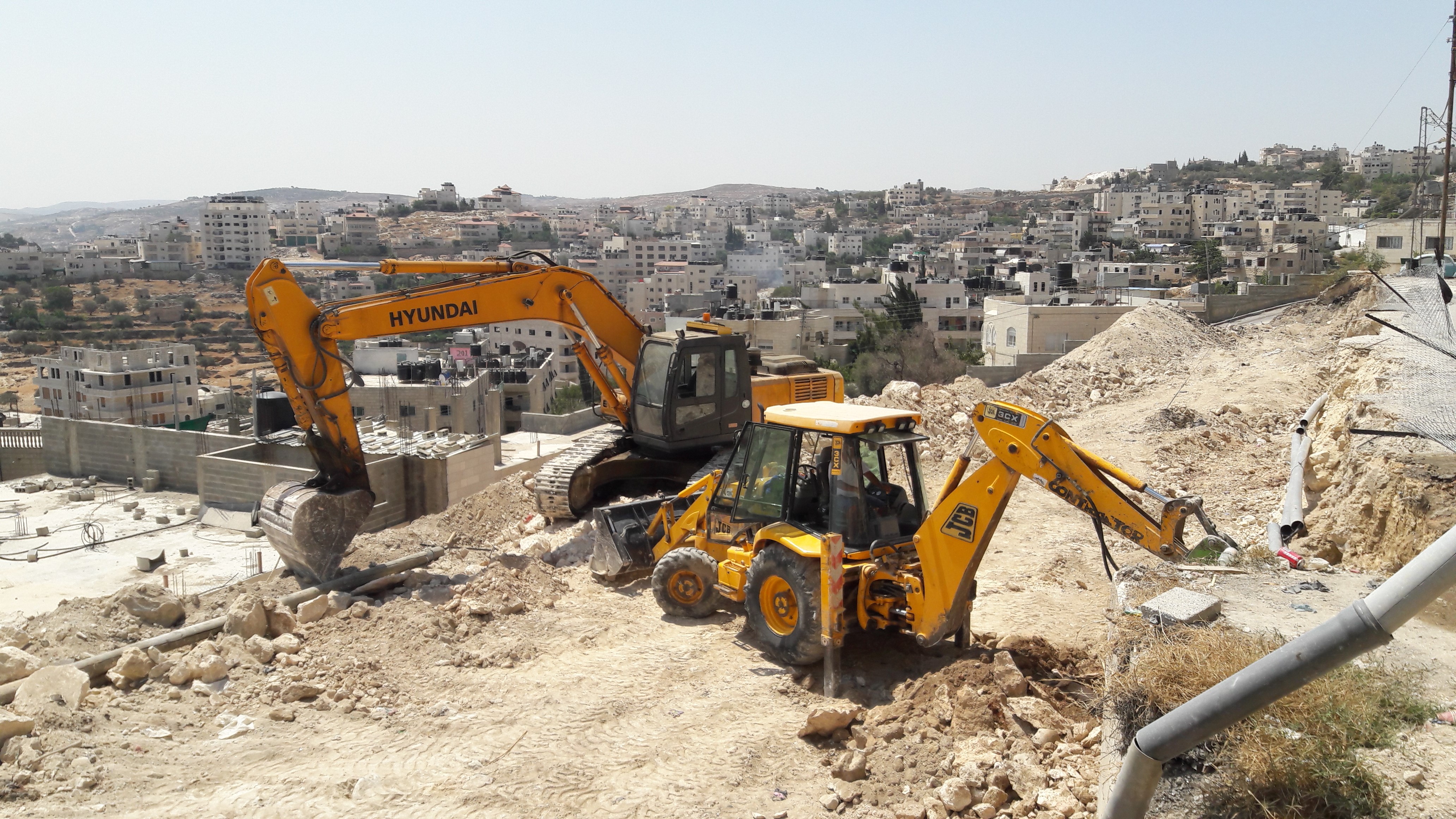 بالصور - أعمال تأهيل شارع الصف