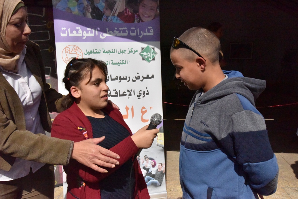 سلمان يشارك في معرض " ع الرصيف " لرسومات الأشخاص ذوي الإعاقة الذهنية  