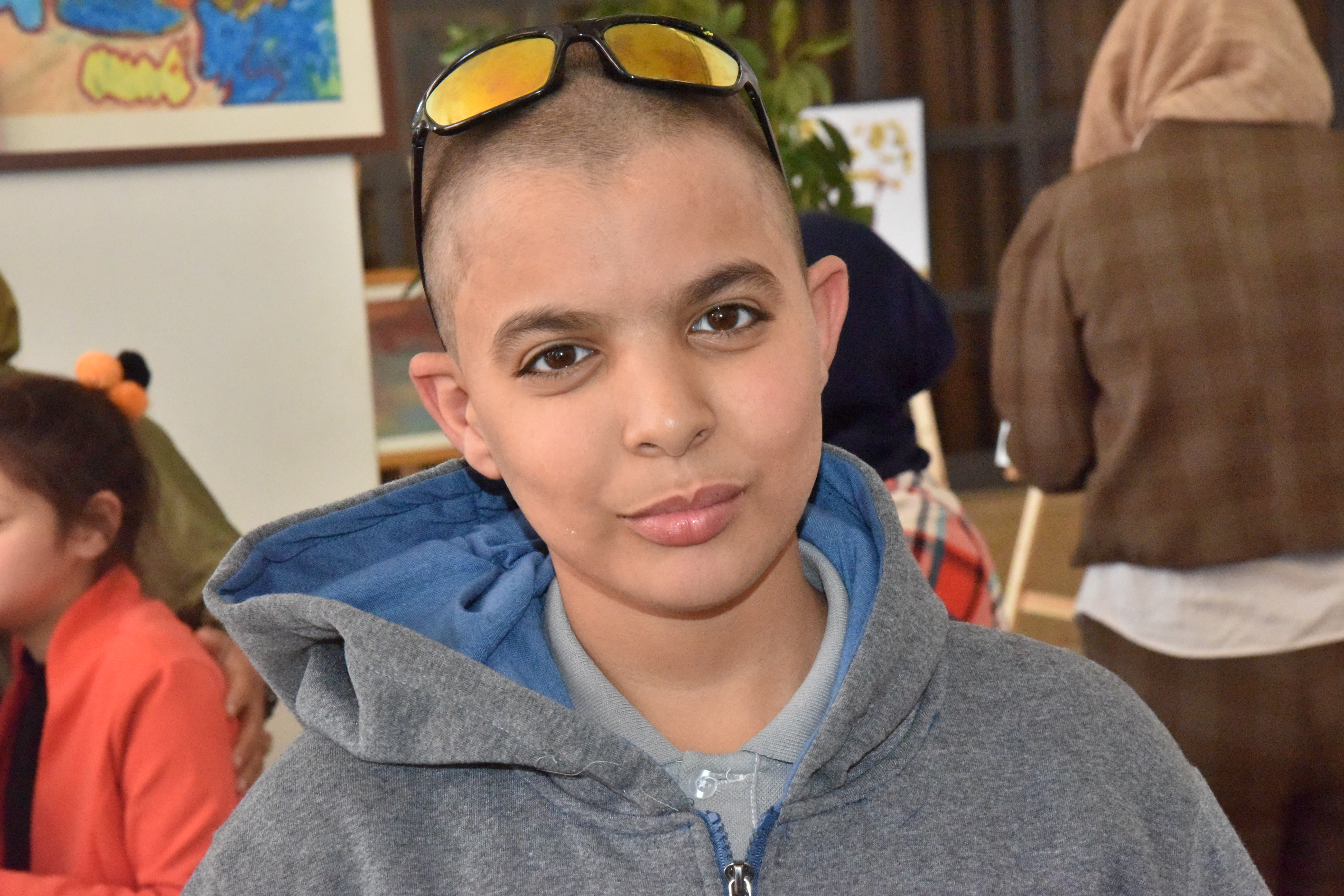 سلمان يشارك في معرض " ع الرصيف " لرسومات الأشخاص ذوي الإعاقة الذهنية  